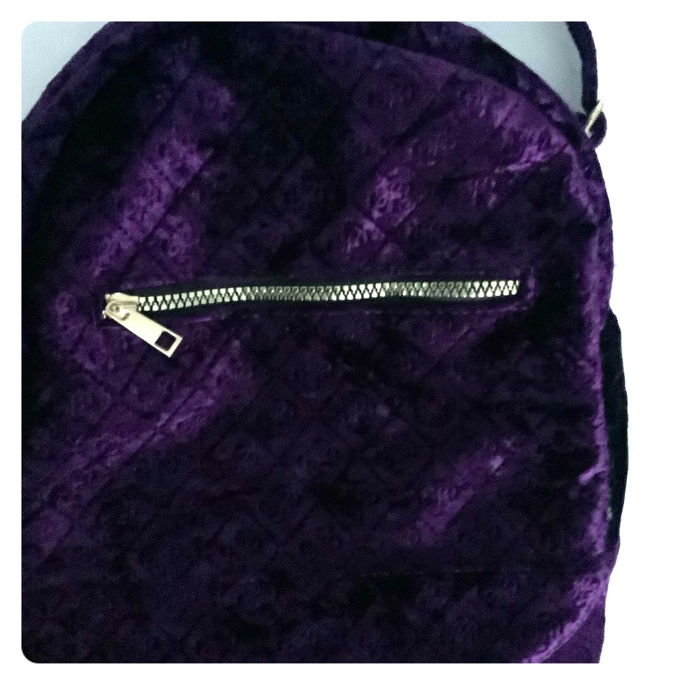 Women’s used pack back color purple size medium
